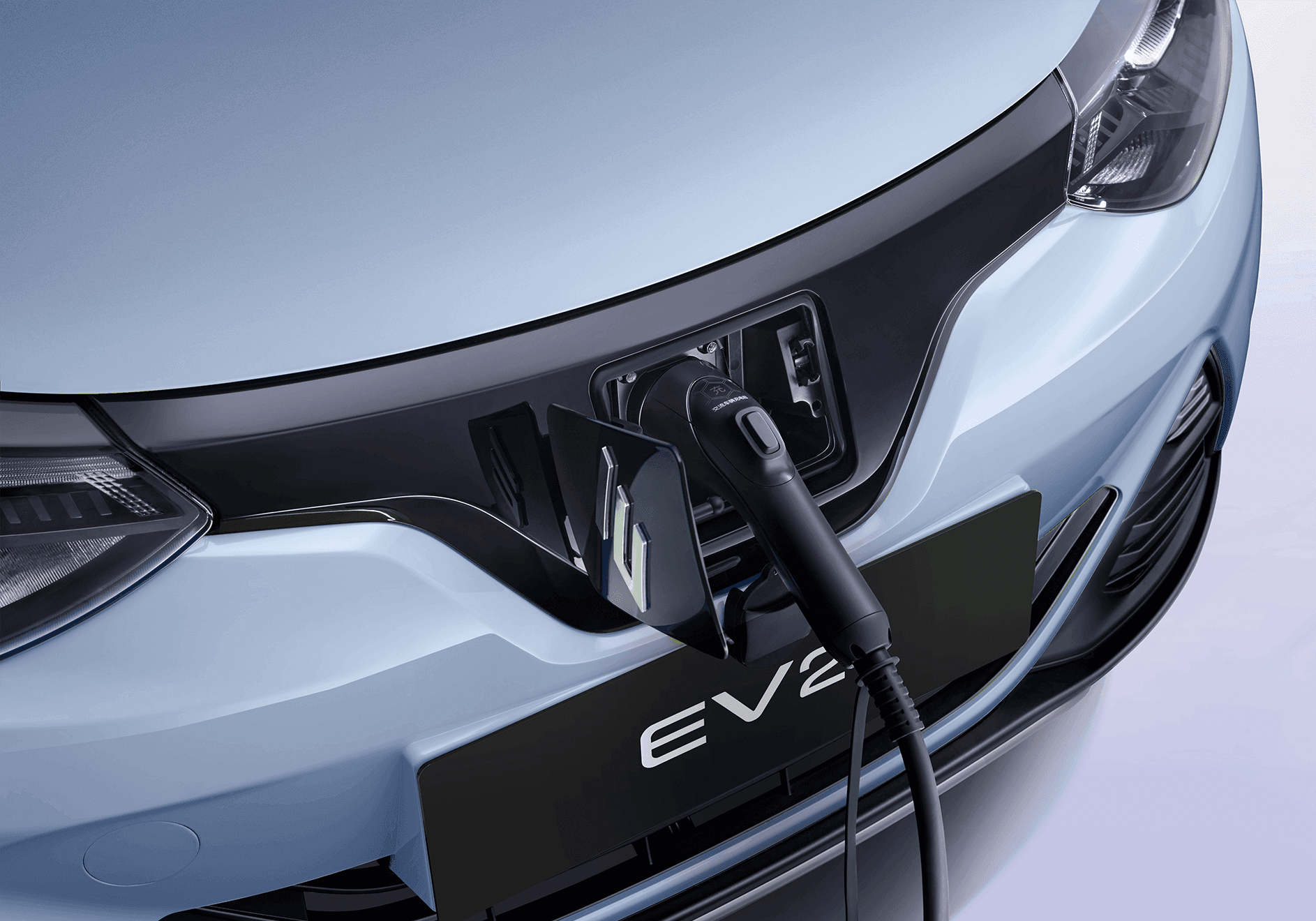JMEV EV2 celeste vista cenital en entrada de casa