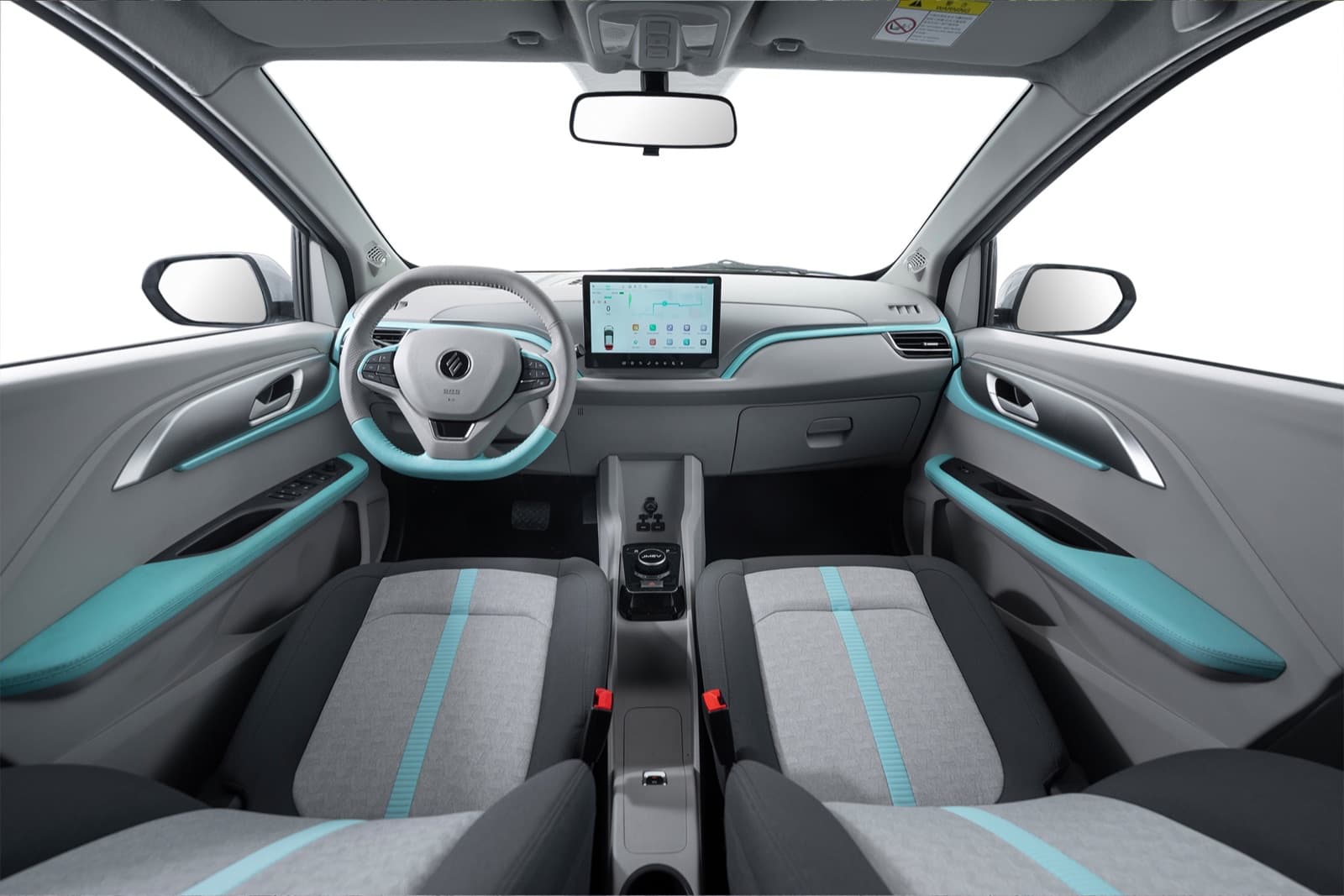 Interior del JMEV EV3 con pantalla central de 10,1 pulgadas y tapizado en dos tonos